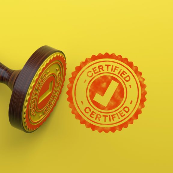 Certified Rubber Stamp On Yellow Background